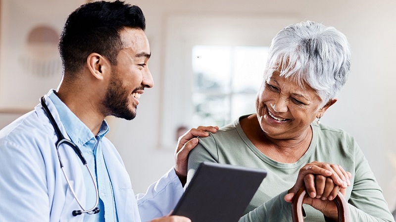 Senior woman speaking with her medical practitioner