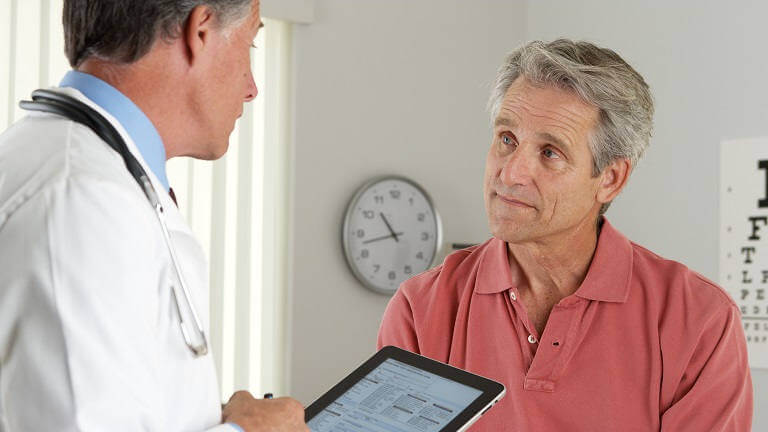 older male with doctor