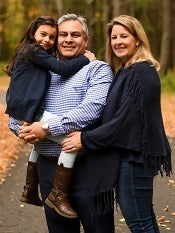 Stephanie and Luis with their daughter