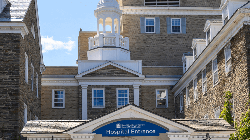 The cupola and signage is seen on Bassett Medical Center's Fieldstone Building