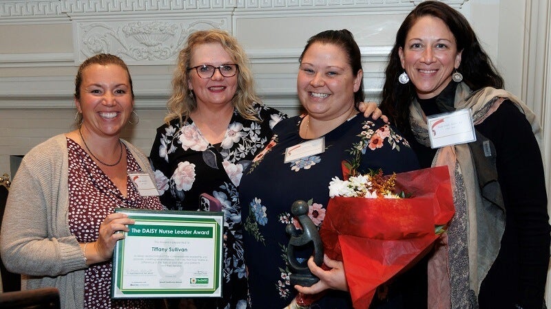 Tiffany Sullivan, RN, nursing manager at A.O. Fox Hospital receiving the Team Leader Award