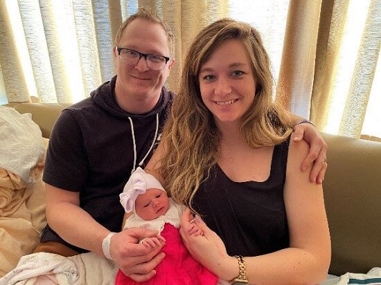 Coffman Family - Parents Garrett and Mallory Coffman with baby Savvy