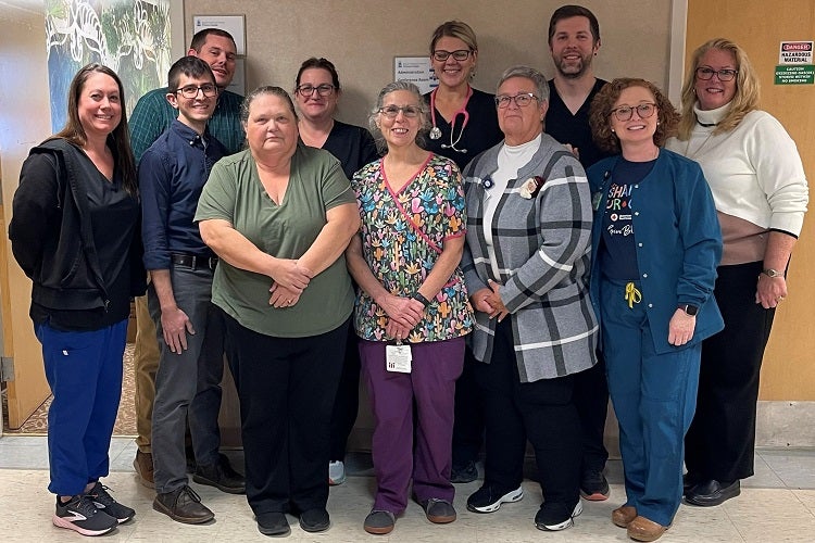 O’Connor Hospital leaders, team members, and caregivers gather to celebrate their Chartis Center for Rural Health Performance Leadership Award